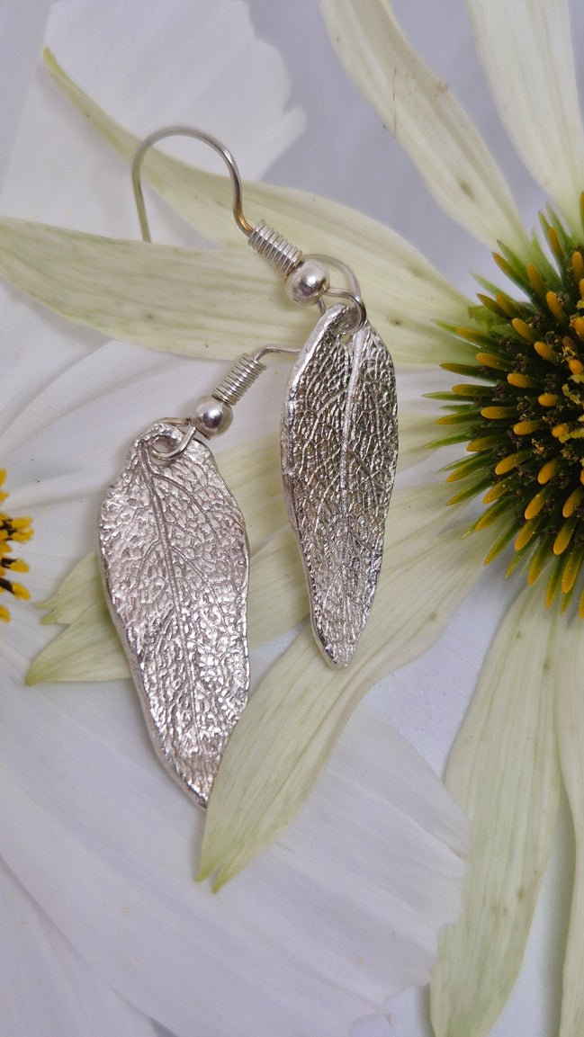 Hand-finished botanical sage-leaf earrings with natural vein textures