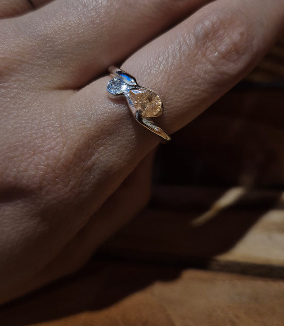 Twist of Fate Wave Ring – A Dance of Light and Fate
