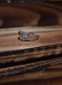 Twist of Fate Wave Ring – A Dance of Light and Fate