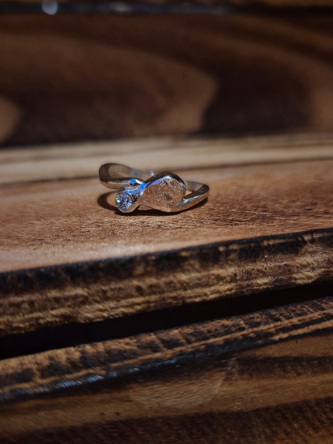 Twist of Fate Wave Ring – A Dance of Light and Fate